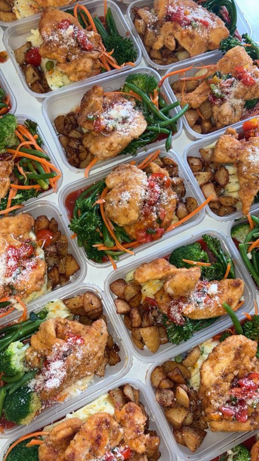 Trays of chicken, rice and veg